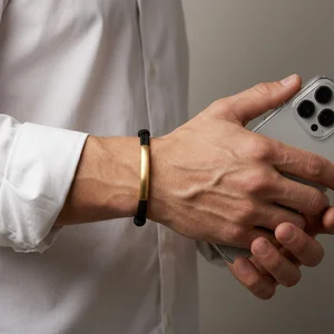 Men's gold bar bracelet with phone