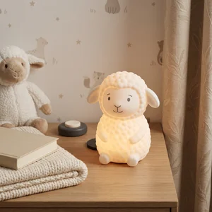 Cozy sheep night light on wooden nightstand