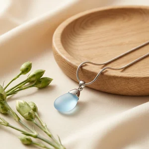 Elegant necklace on draped fabric