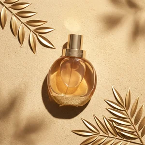 Luxury perfume on golden sand