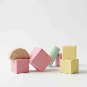 Pastel wooden blocks on white