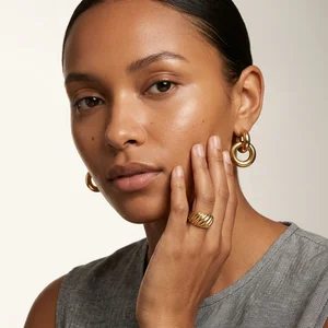 Elegant gold jewelry on model