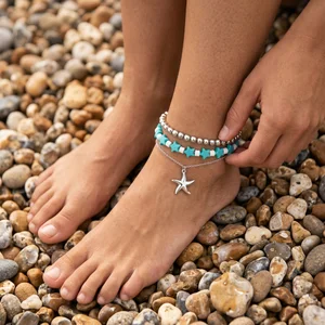 Ocean anklets on pebble beach