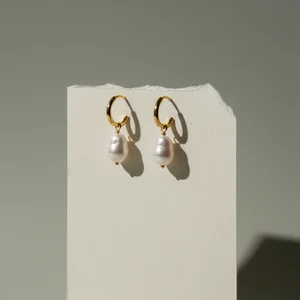 Pearl drop gold hoop earrings