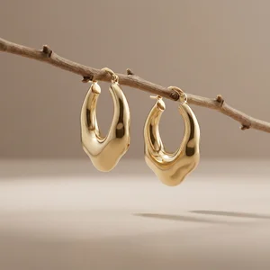 Organic gold hoops on natural branch