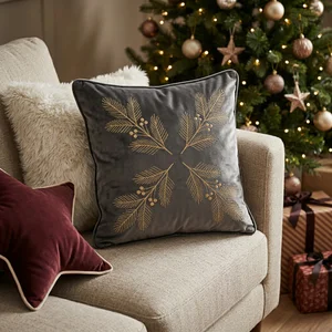 Festive velvet cushion on armchair