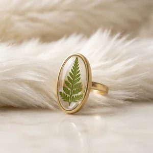 Botanical fern ring on marble