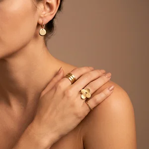 Elegant gold rings on model