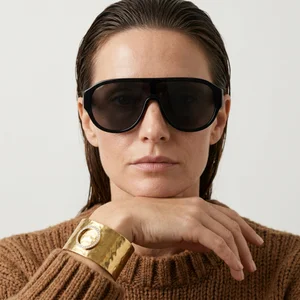 Chic gold bracelet and sunnies