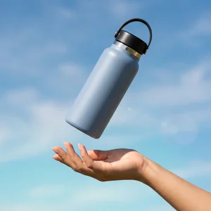 Floating water bottle in sunny sky