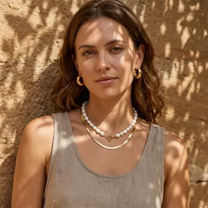 Elegant woman in pearl necklace