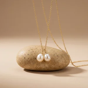 Pearl necklace on natural stone