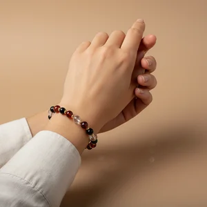 Delicate bracelet on warm hands