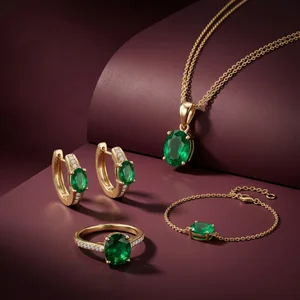 Elegant emerald jewelry set on burgundy