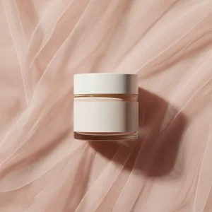 Delicate skincare jar on silk