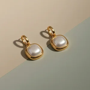 Elegant pearl and gold earrings
