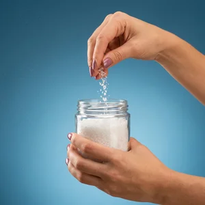 Sprinkling salt from glass jar