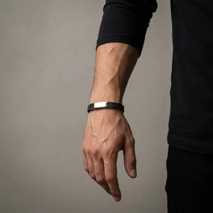 Minimalist male steel bracelet on hand