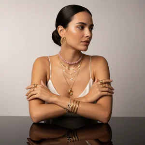 Elegant woman in gold jewelry