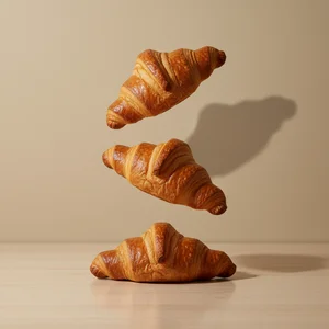 Golden Croissants in Motion