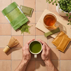 Matcha tea ritual on tiled surface