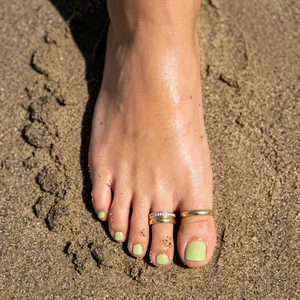 Summer toe rings on sand