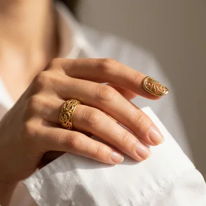 Elegant gold jewelry on hand