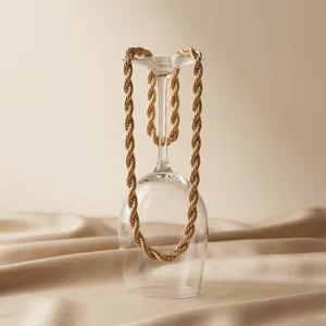 Gold chain on inverted glass