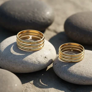 Golden Rings on White Pebbles