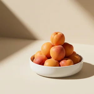 Sunny apricots with dramatic shadow