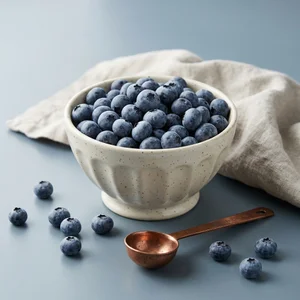 Fresh blueberries in white bowl