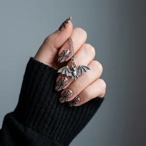 Spooky bat necklace hand shot