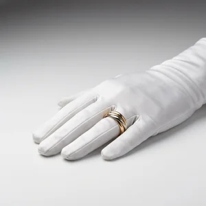 Elegant ring on satin glove