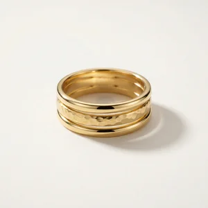 Elegant gold band with textured detail