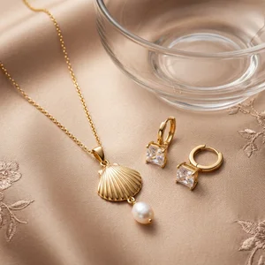 Elegant gold jewelry on satin