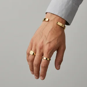 Modern gold jewelry on hand