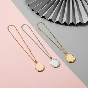Modern minimalist necklaces on pink and grey