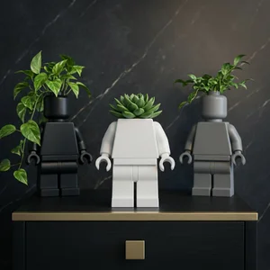 Modern robot planters on marble