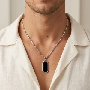 Men's black pendant necklace on model