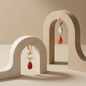 Elegant earrings on beige arches