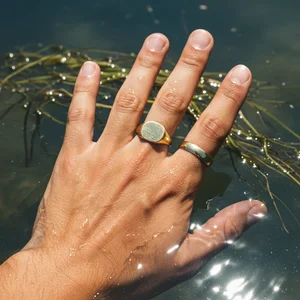 Ornate ring in shimmering water