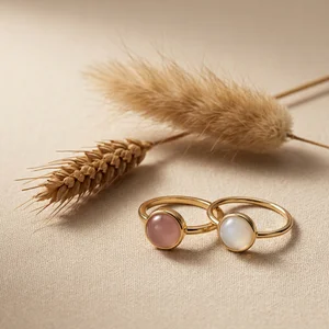 Elegant gemstone rings on linen