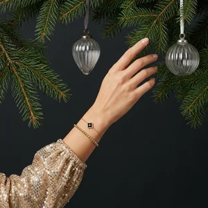 Festive gold bracelet on hand
