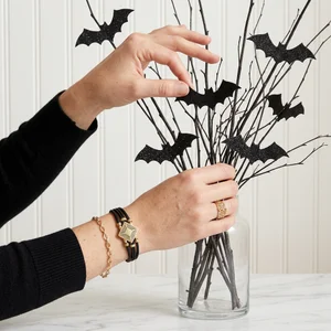 Minimalist Halloween bat branch decor