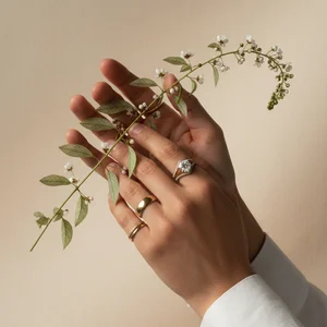Delicate Hands with Greenery