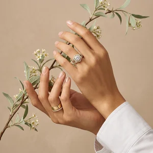 Elegant gold rings with floral branch