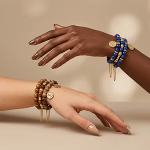 Stacked bracelets on diverse hands
