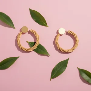 Woven golden hoop earrings