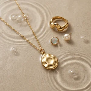 Gold jewelry in rippling water