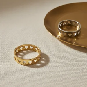 Heart band rings on gold tray